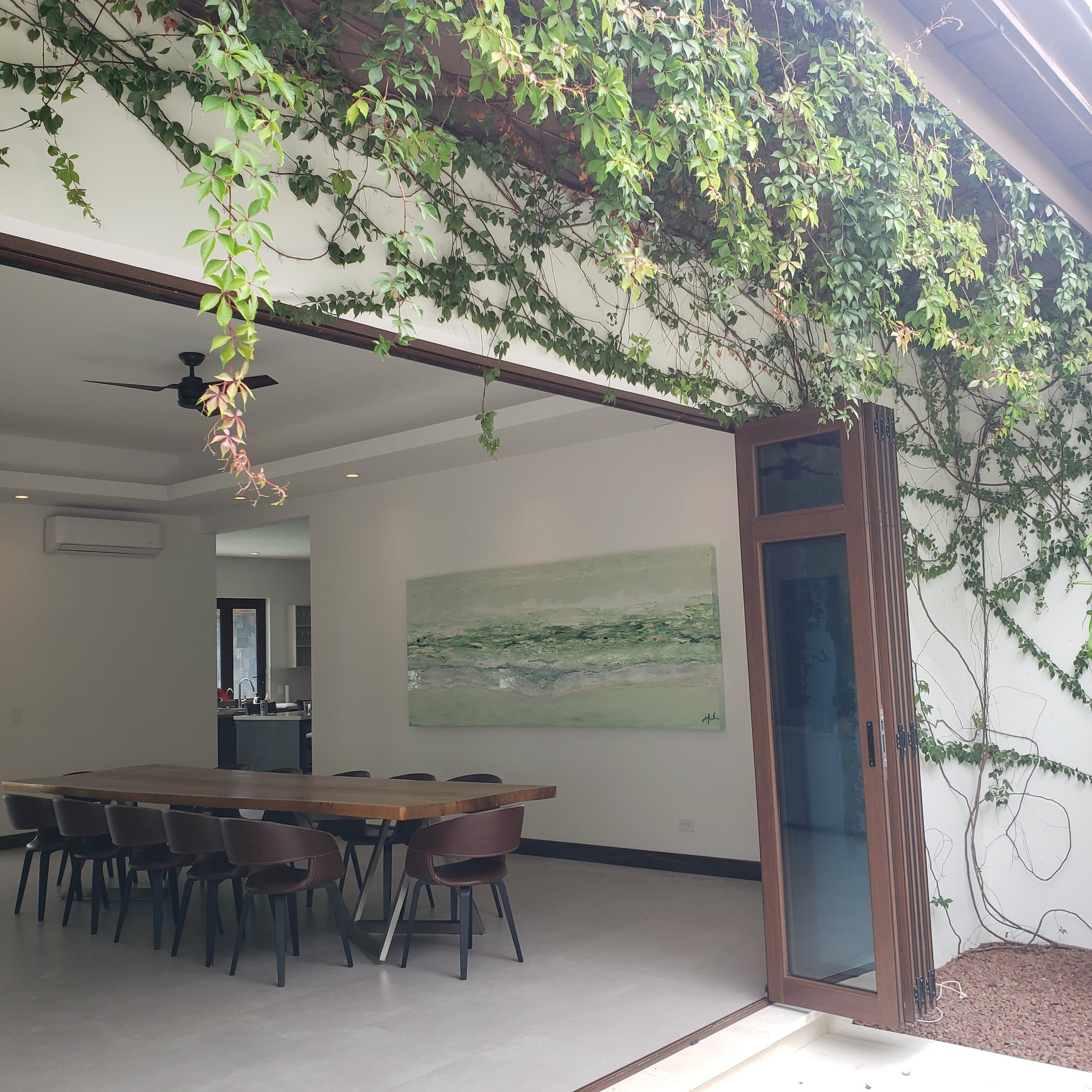 An original painting by Malu Moreira installed in a home — collected work 69, Guanacaste, Costa Rica